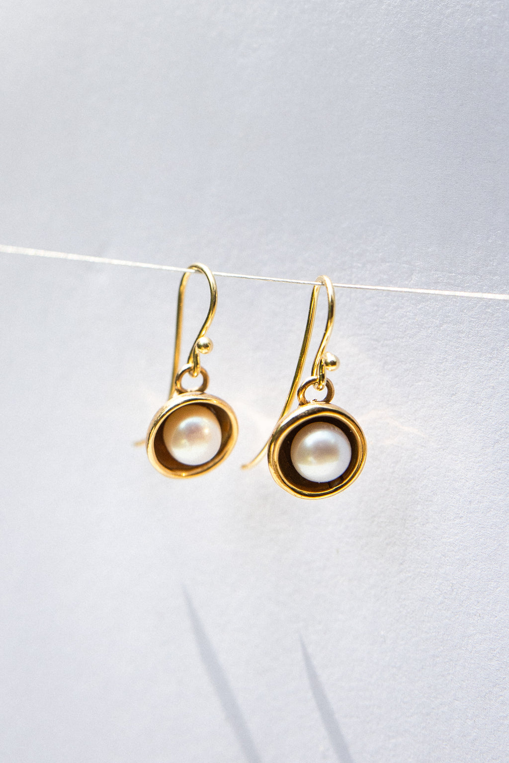 Orecchini in bronzo e perle